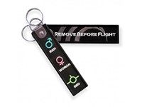 Remove before flight sleutelhanger + WOVEN logo